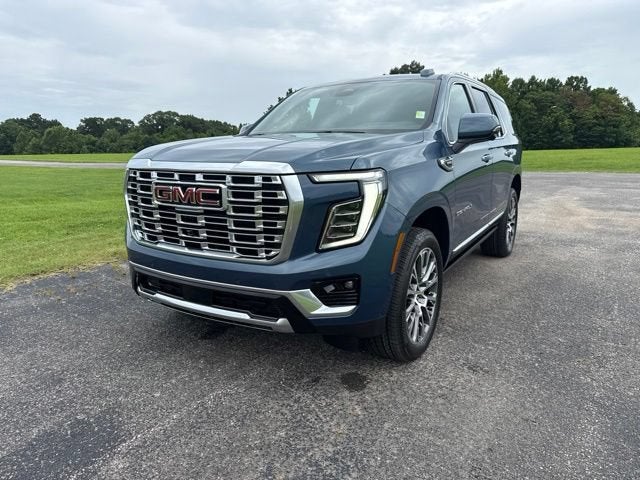 2026 GMC Yukon Denali in Downpour Metallic — front three-quarter view