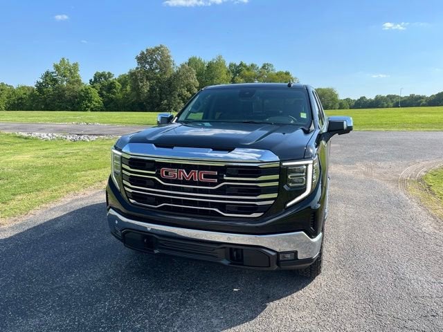 2026 GMC Sierra 1500 SLT in Onyx Black — front three-quarter view