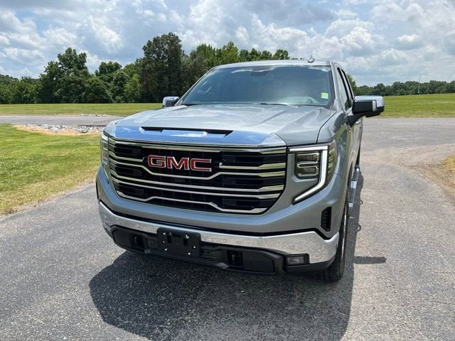 2026 GMC Sierra 1500 SLT in Sterling Metallic — front three-quarter view