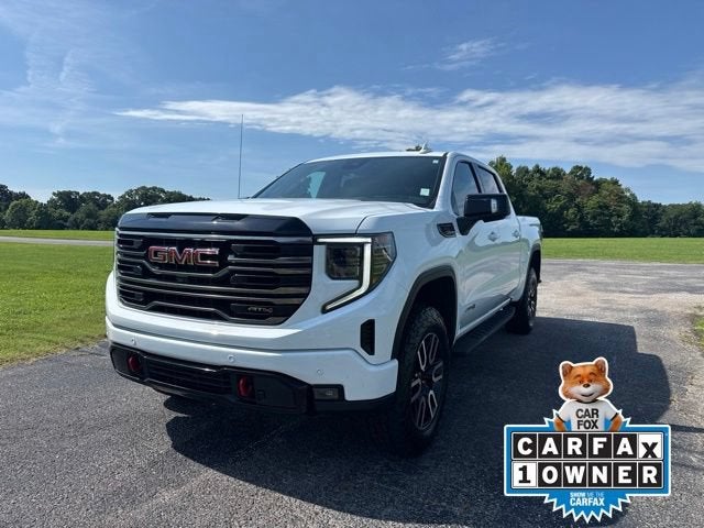 2025 GMC Sierra 1500 AT4 in Summit White — front three-quarter view