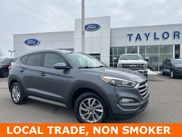 2018 Hyundai Tucson SEL in Coliseum Gray — front three-quarter view